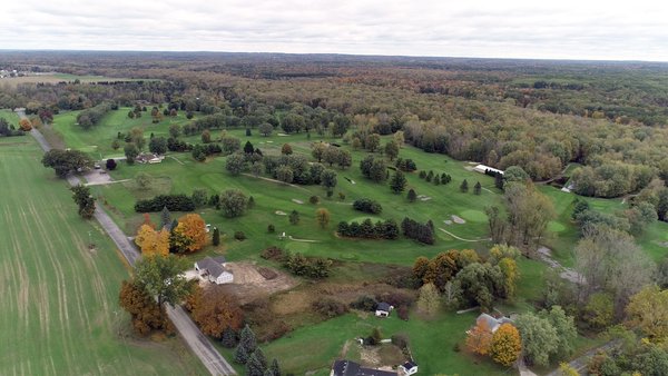 ROGUE RIVER GOLF CLUB AUCTION - 144+/- ACRES IN 13 TRACTS IN KENT COUNTY, MICHIGAN
